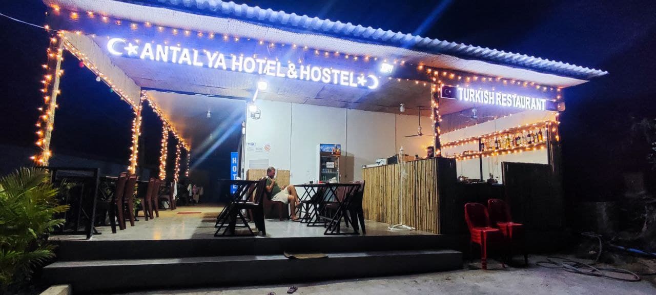 Antalya Turkish Restaurant exterior at night with string lights